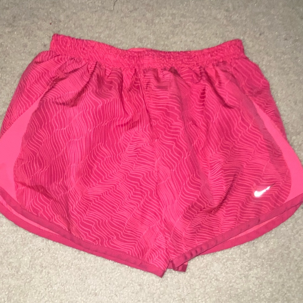 Pink Nike athletic shorts